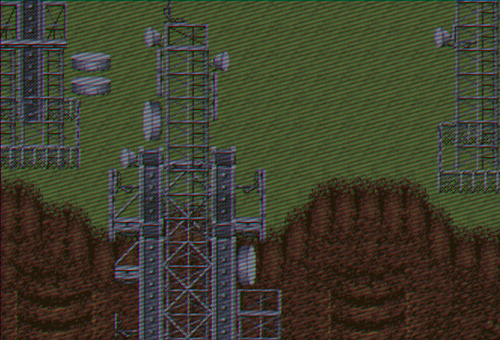 A tilemap depicting radio towers and enormous tank tracks