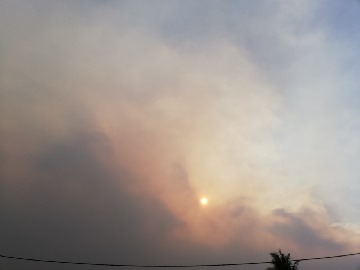 Sunset through smoky clouds